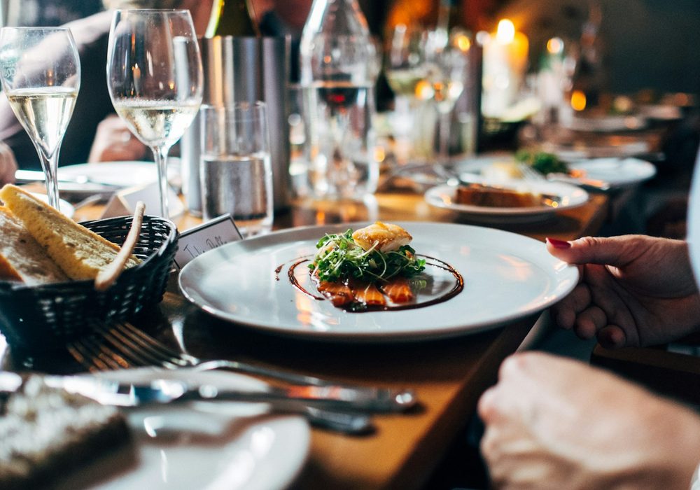 Plated seasonal entrée served tableside with wine