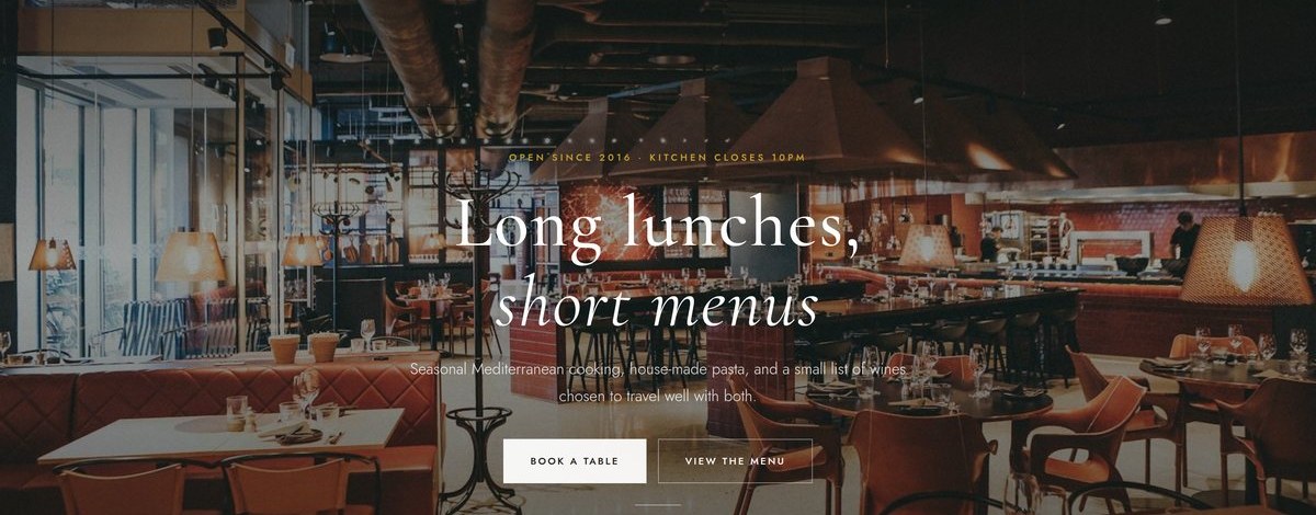 Example website for The Olive Table, showing a full-bleed dining room hero, menu and reservation form